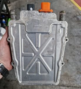 Failed high-voltage coolant heater removed from a Range Rover Evoque PHEV